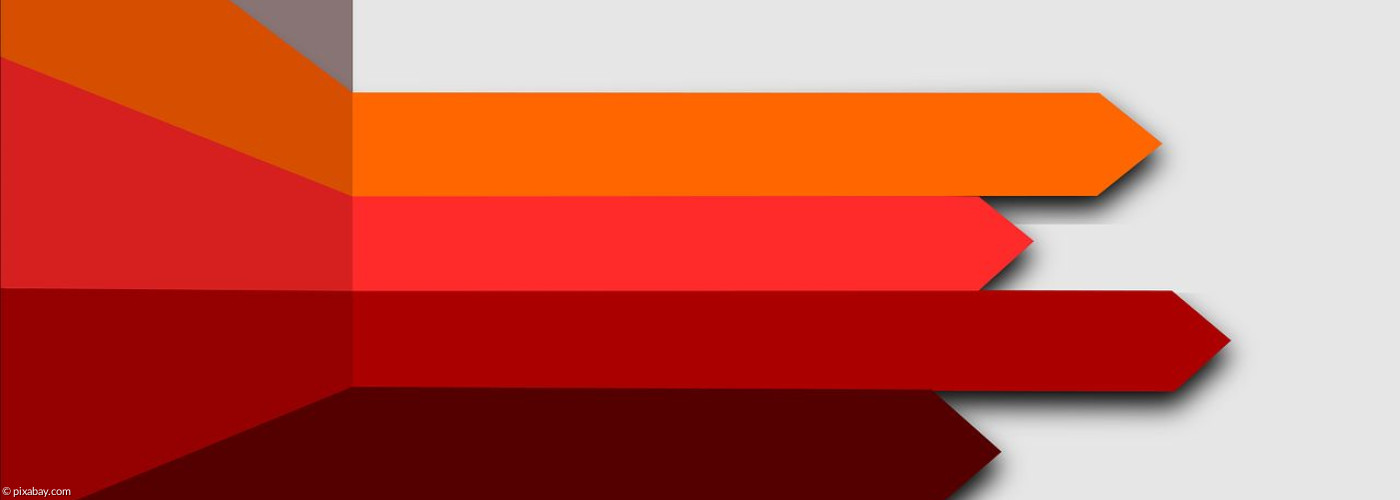 Pfeile in verschiedenen Rottönen weißen nach rechts